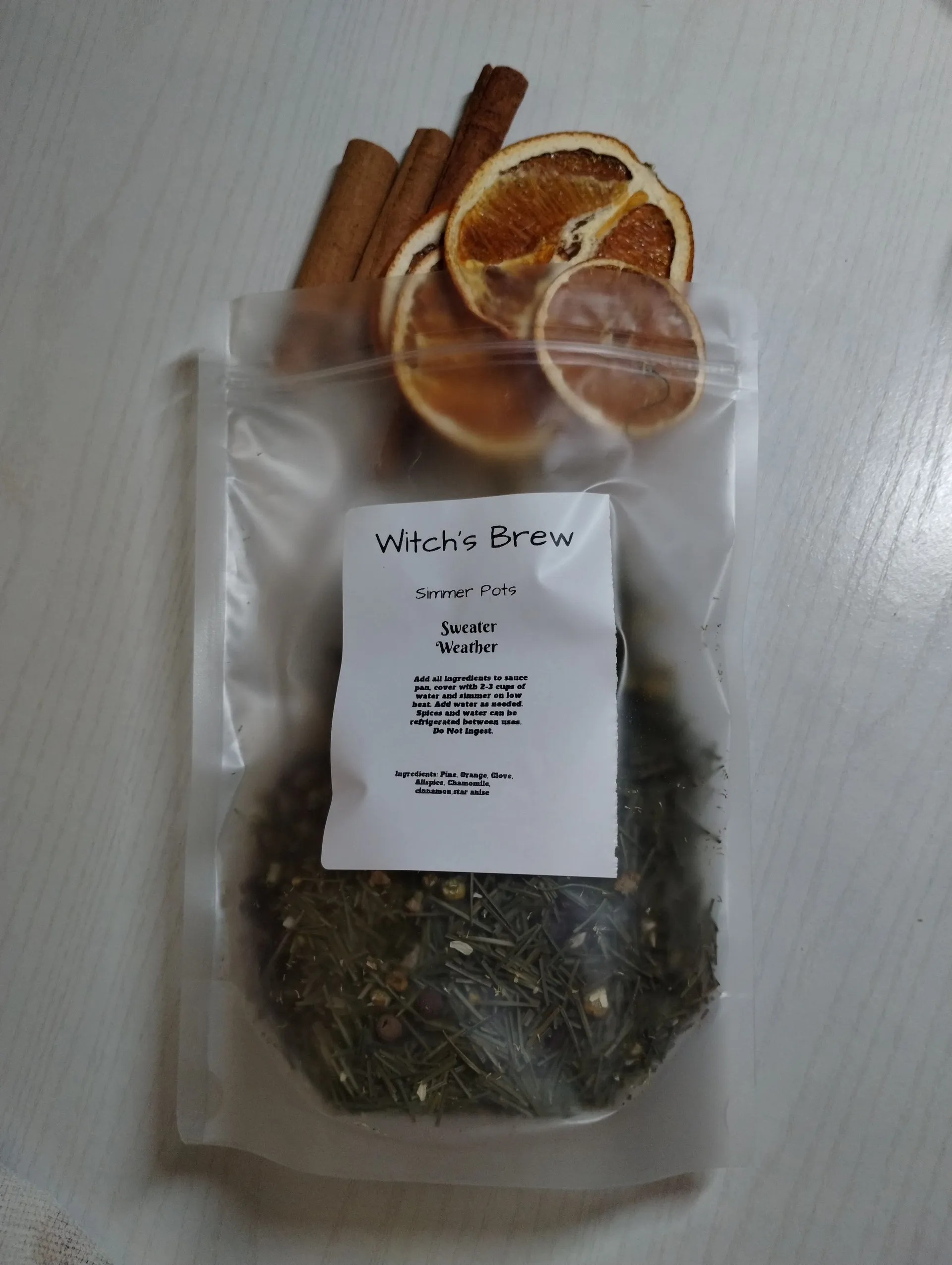 Sweater Weather simmer pot pouch with dried orange, cinnamon, and botanicals